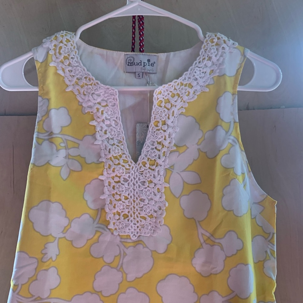 Sunny, yellow, and white dress with pretty lace trim